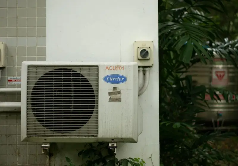 Technician servicing a furnace